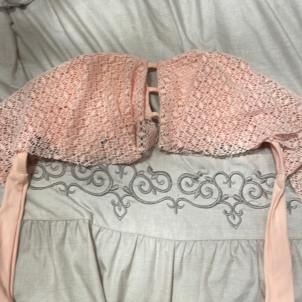 Peach pink bikini top.